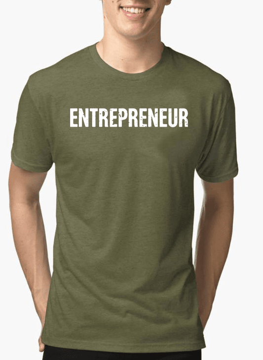 Person wearing a green t-shirt with 'ENTREPRENEUR' printed on it against a white background
