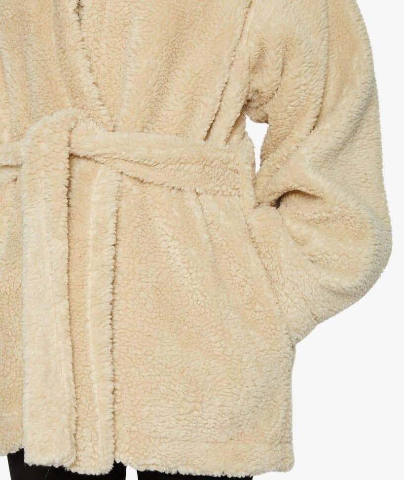 Beige sherpa coat with a belt on a white background