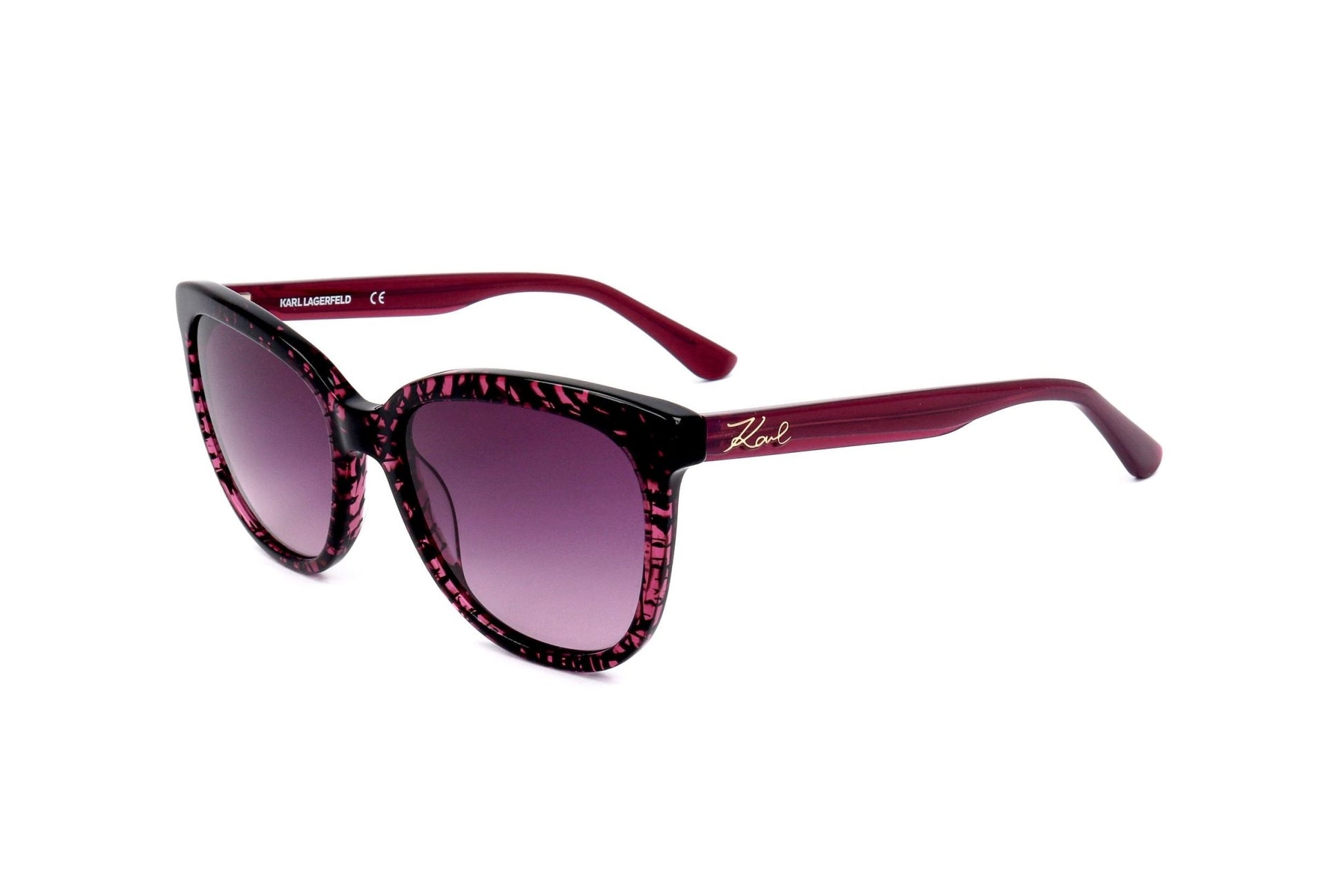 Sunglasses with purple lenses and red frame on a white background