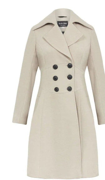 Beige trench coat with black buttons on a white background