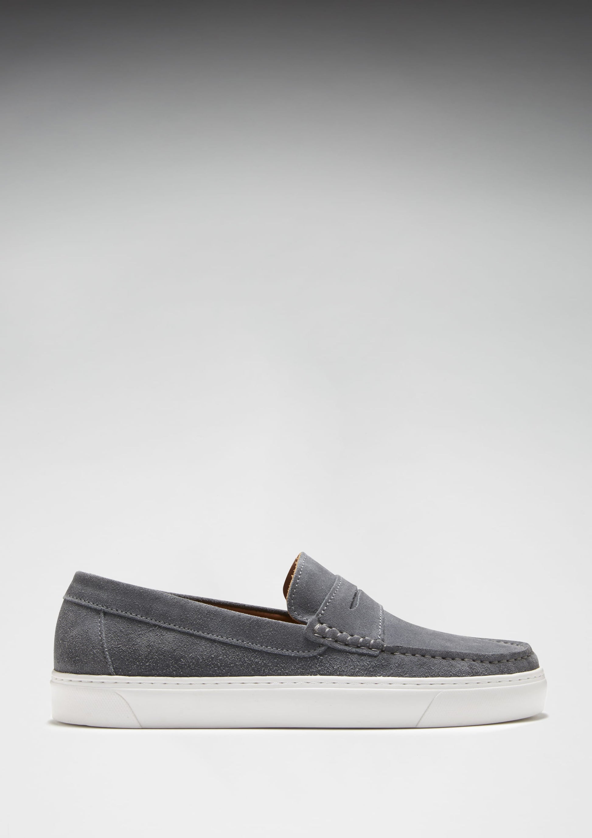Gray loafer shoe on a light gray background