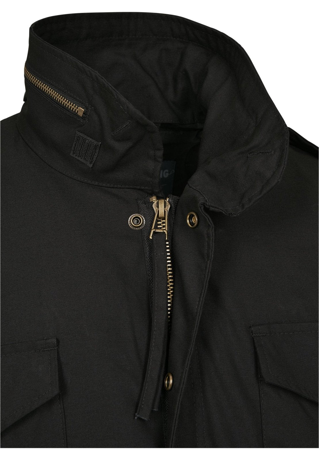Close-up of a black jacket with a zipper and button details on a white background