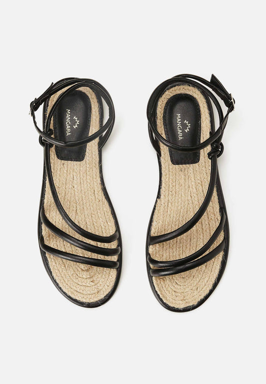 Black strappy sandals with jute sole on a white background
