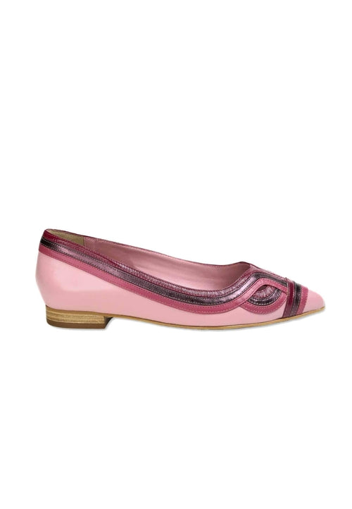Pink flat shoe with a brown sole on a white background