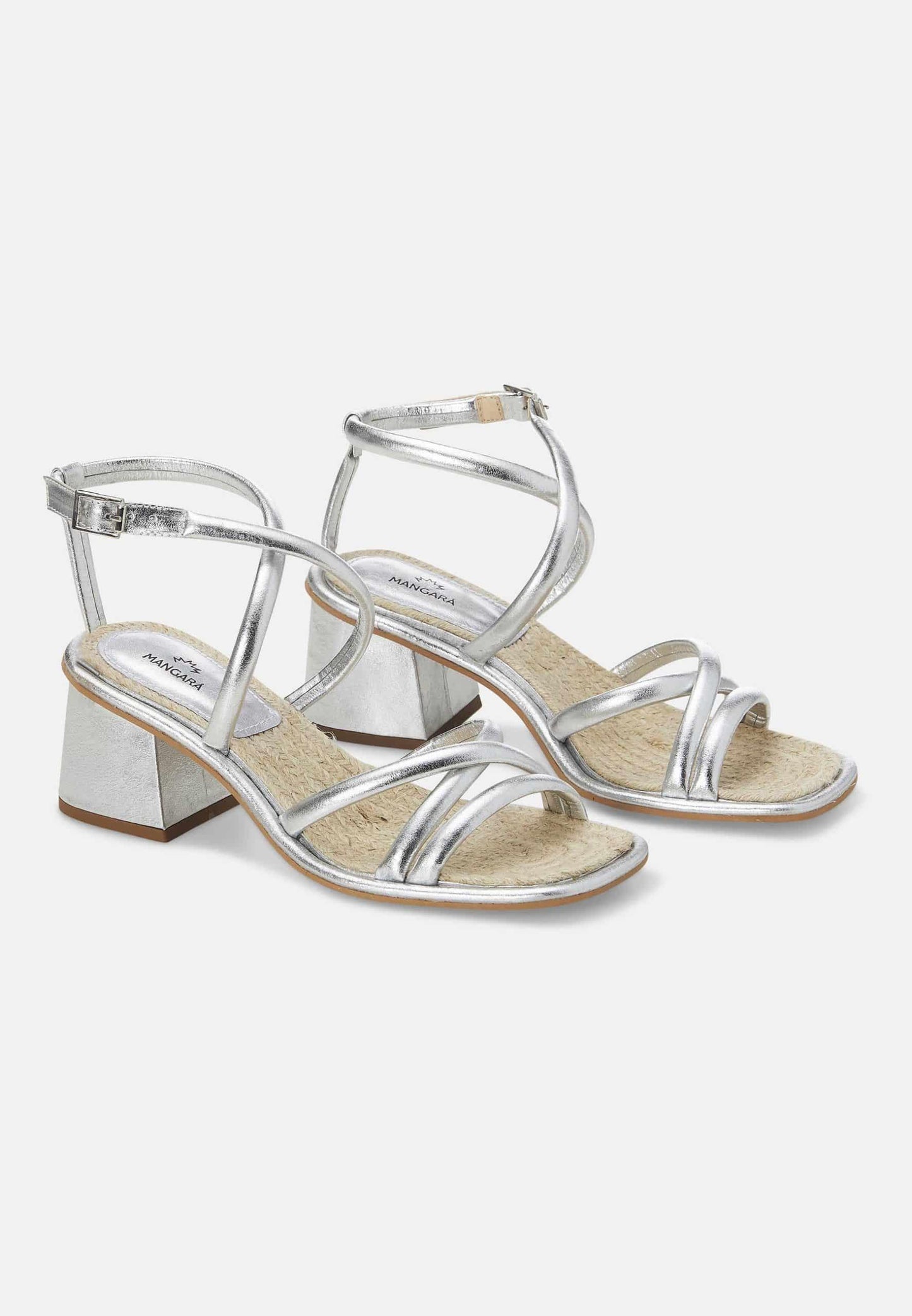Silver high-heeled sandals on a white background