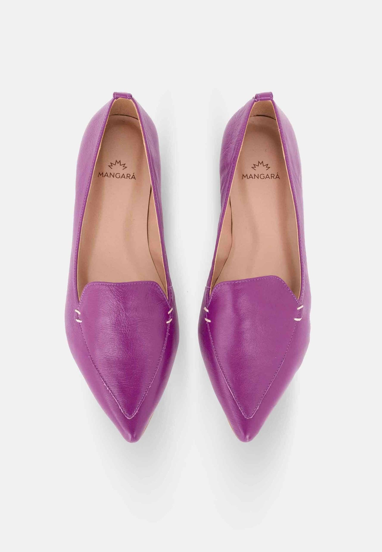 Pair of purple pointed-toe shoes on a white background