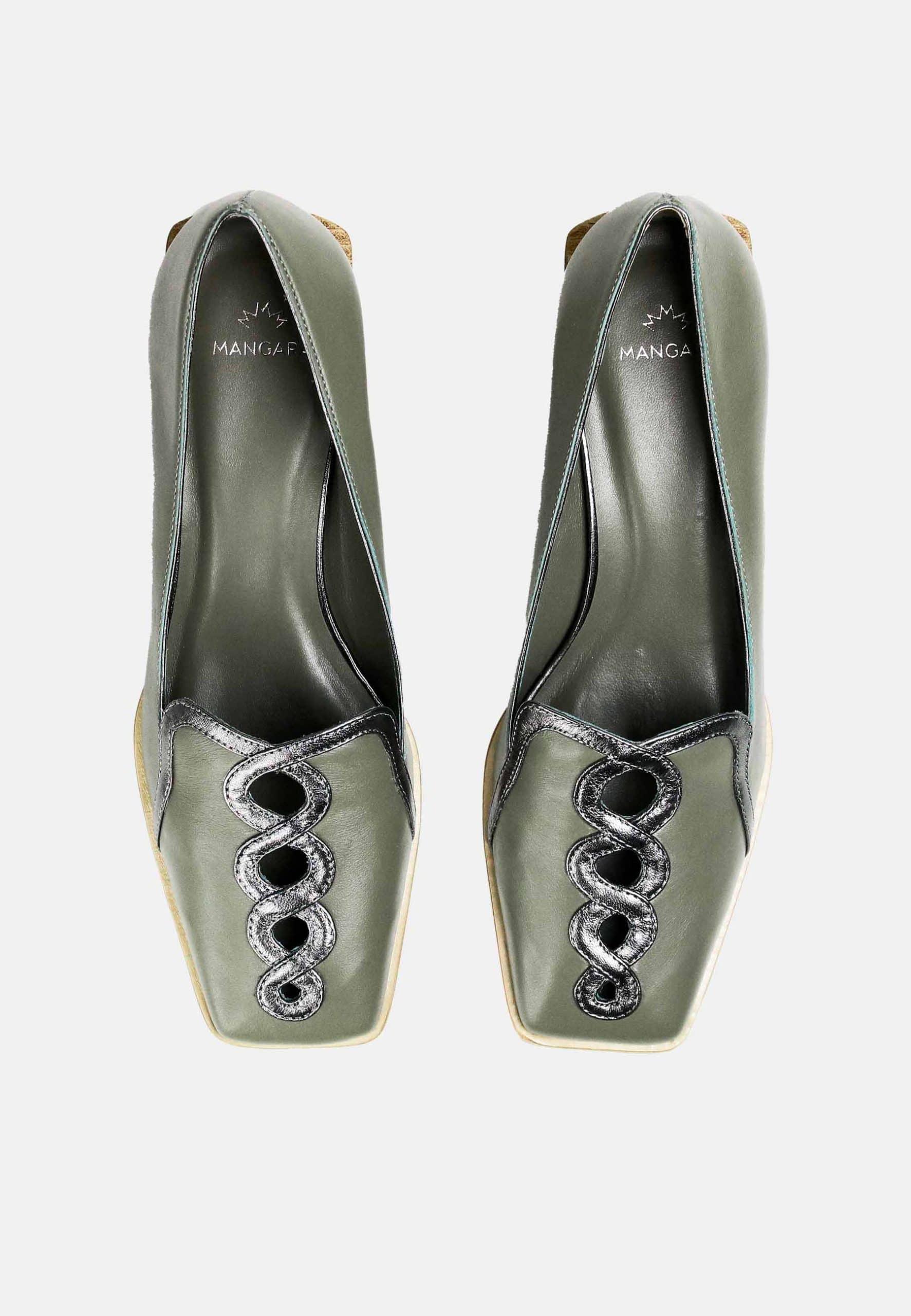 Pair of green high-heeled shoes with decorative elements on a white background