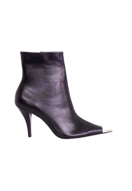Black leather ankle boot with a pointed toe on a white background