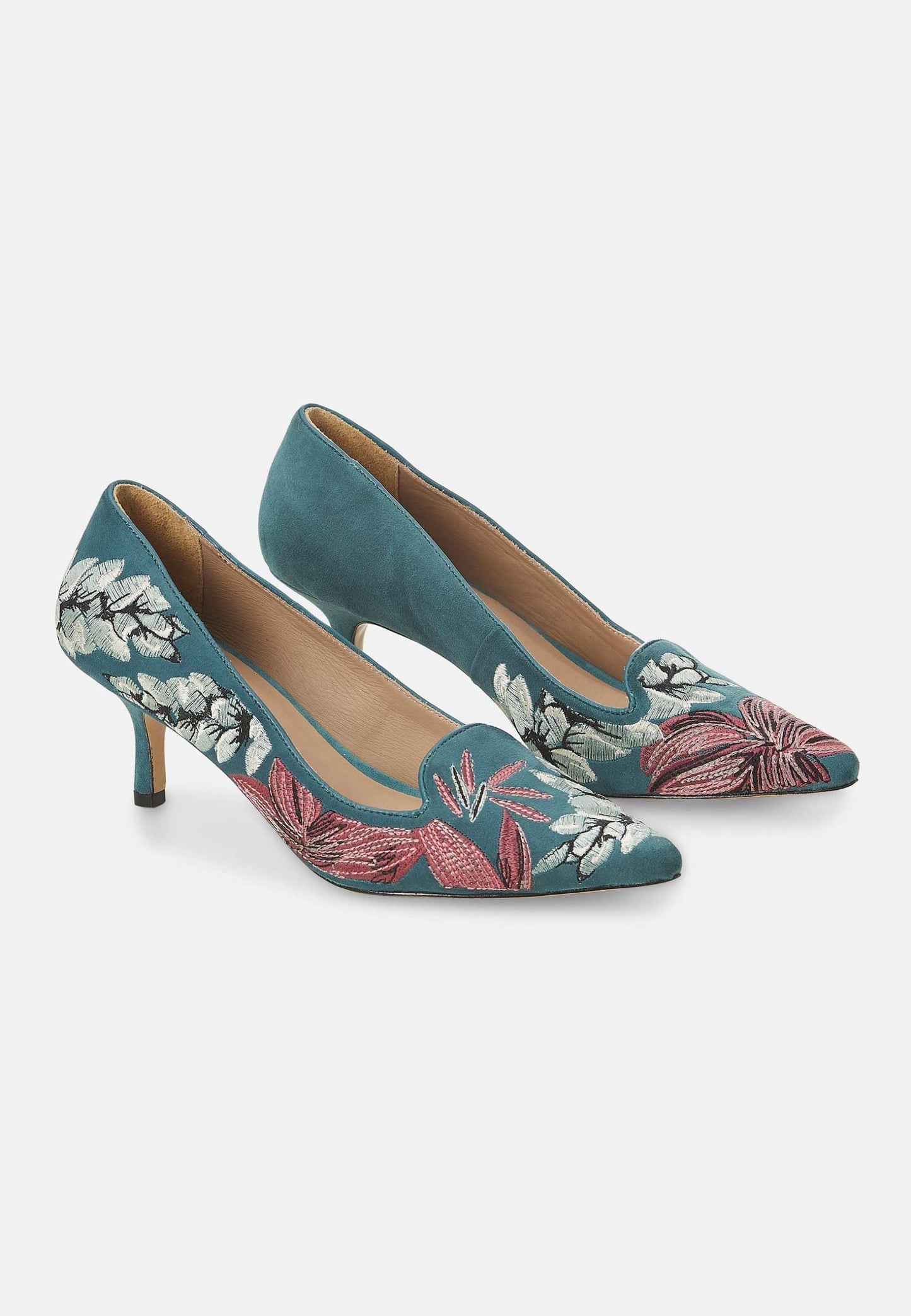 Pair of teal high heels with floral embroidery on a white background