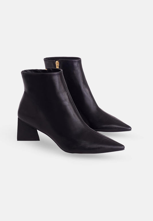 Pair of black ankle boots with a block heel on a white background