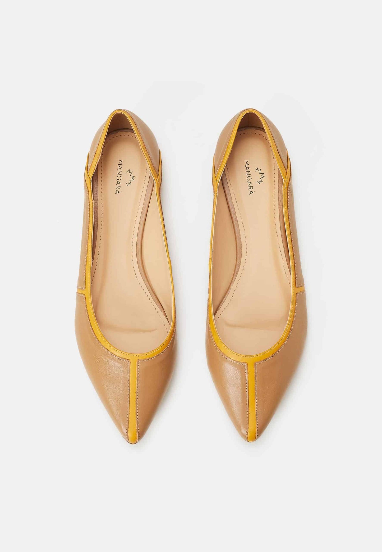 Pair of tan pointed-toe shoes with yellow accents on a white background