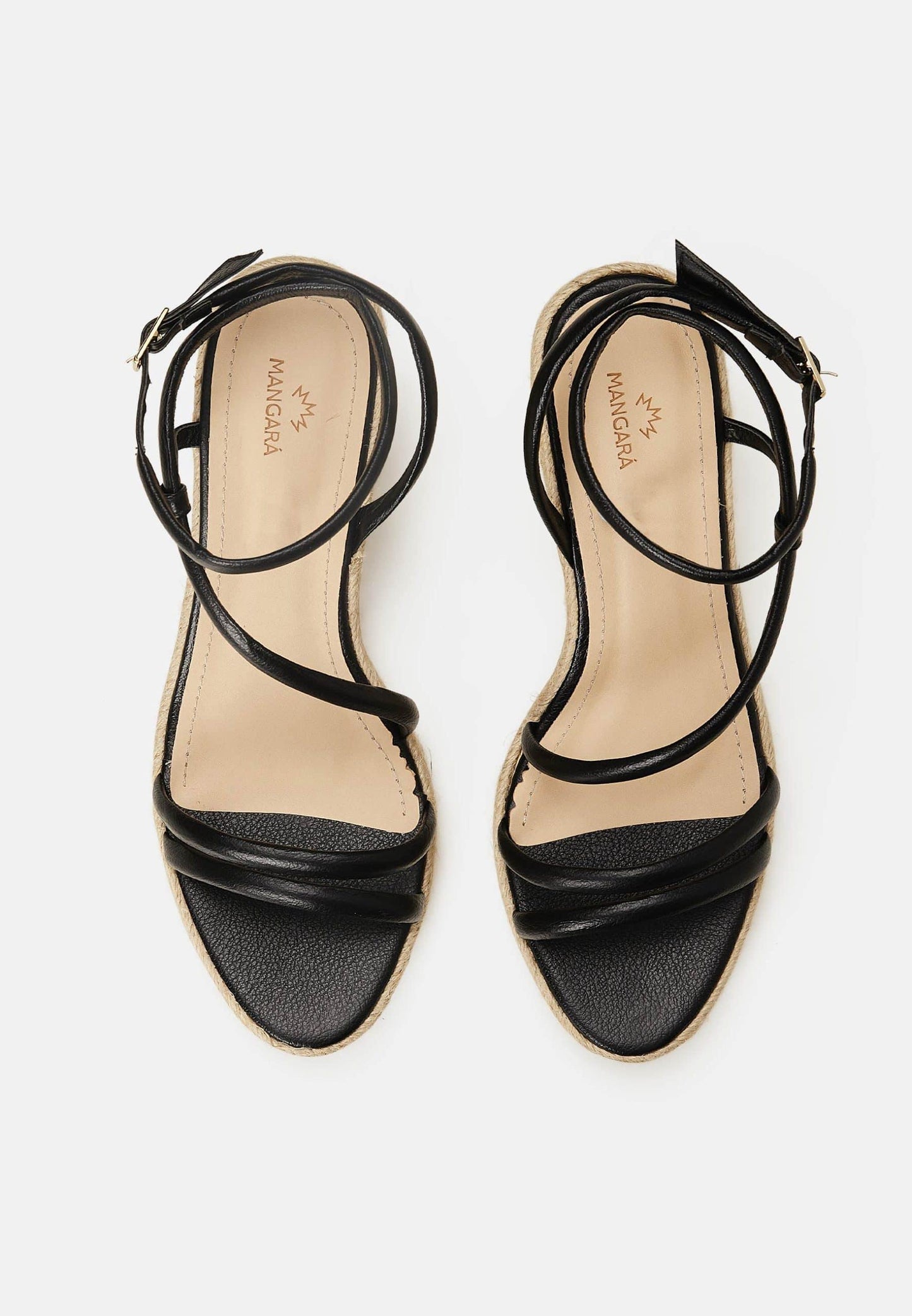 Black strappy sandals on a white background