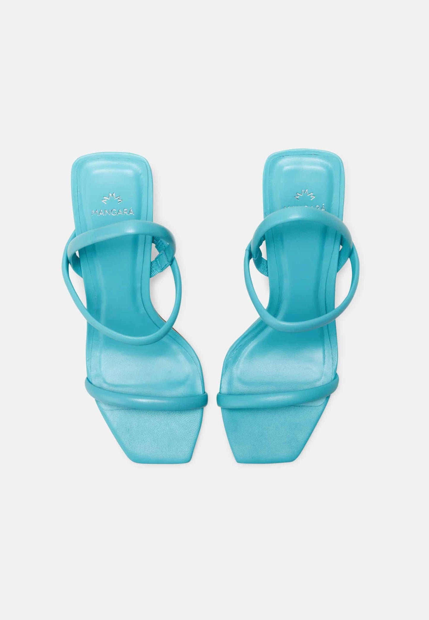 Pair of turquoise high-heeled sandals on a white background