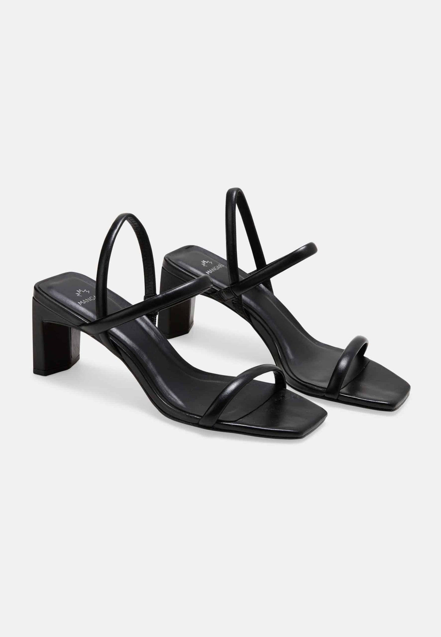 Black high-heeled sandals on a white background
