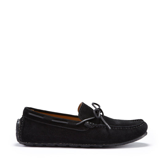 Black loafer shoe on a white background