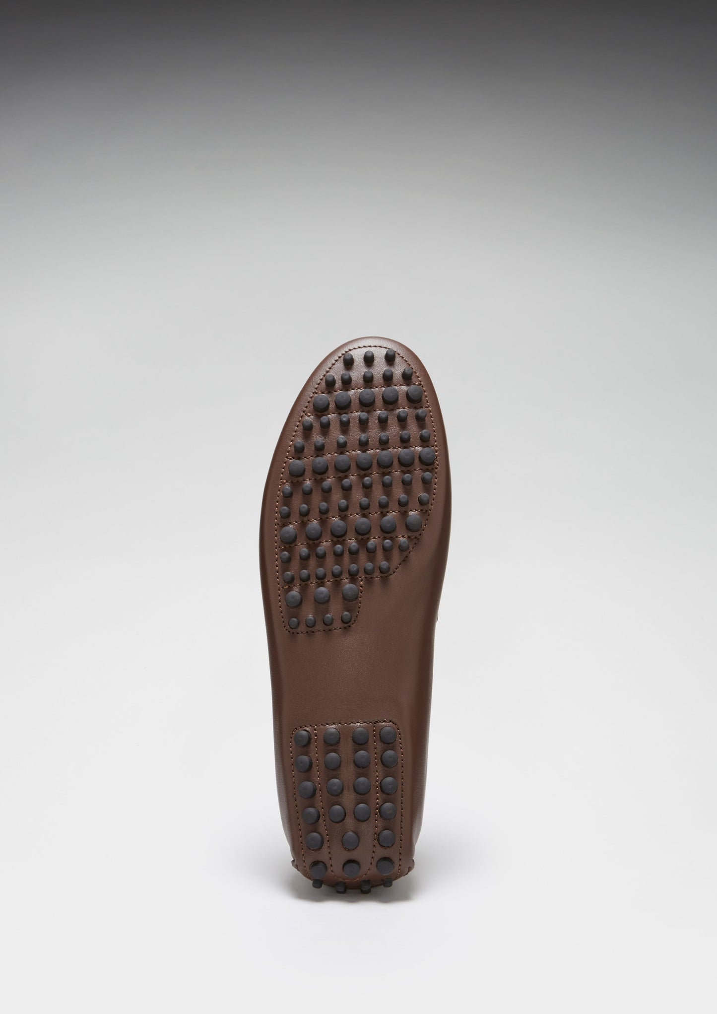 Brown shoe sole on a white background