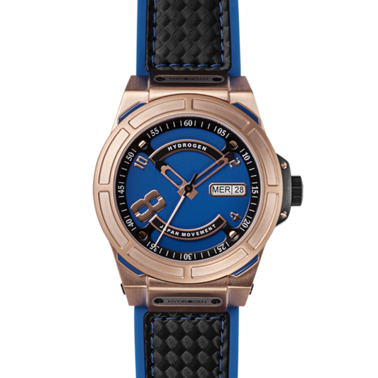 Watch with blue strap and rose gold casing on a white background
