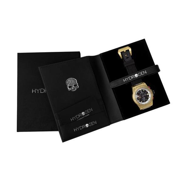 Gold watch and skull pendant in Hydrogen packaging on a white background
