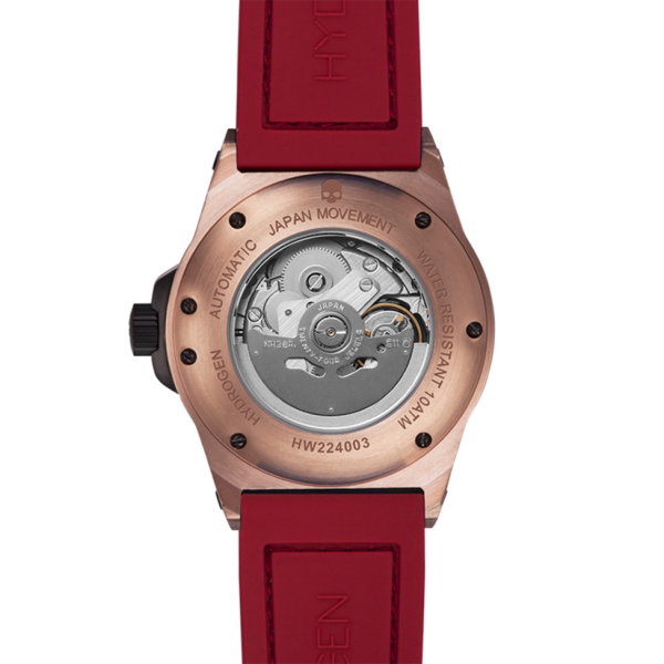 Watch with red strap and rose gold case on a white background