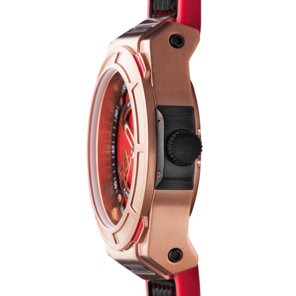 Close-up of a watch with a rose gold case and red accents on a white background