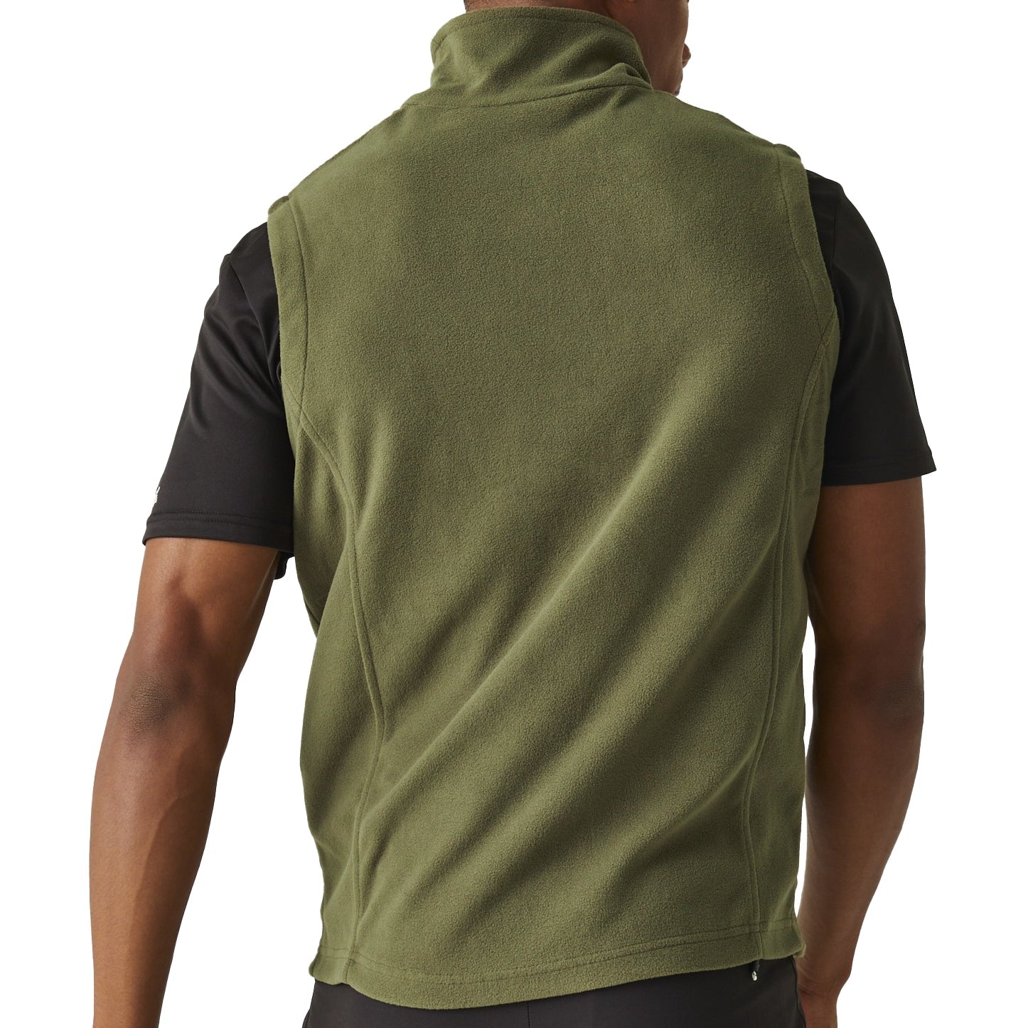 Green vest worn by a person on a white background