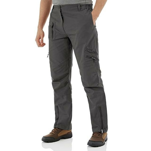 Person wearing gray cargo pants on a white background