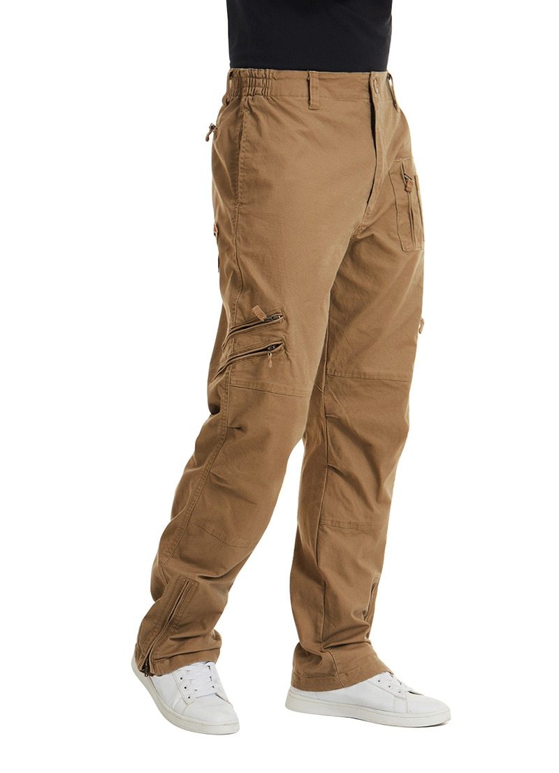 Brown cargo pants worn by a person on a white background