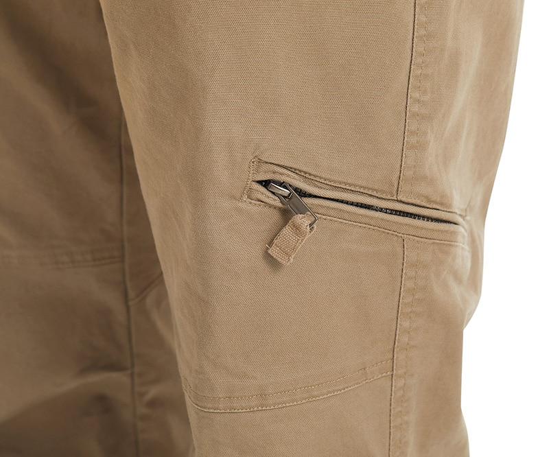 Close-up of beige pants with a zipper pocket on a white background