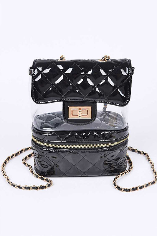 Black quilted handbag with clear backpack section on a white background