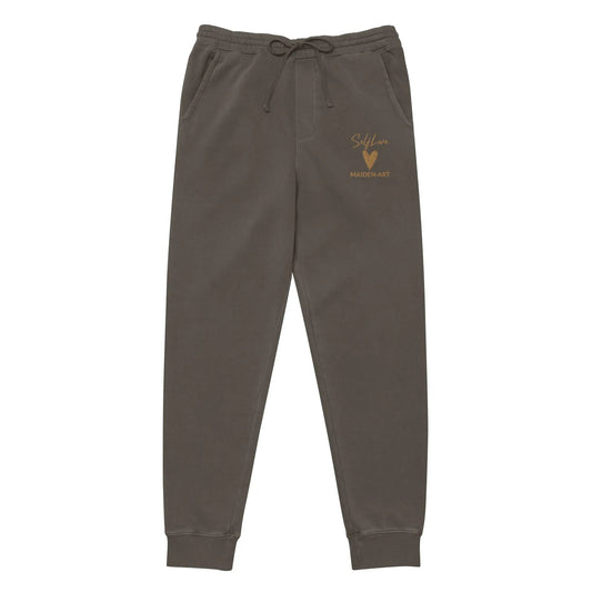 Brown sweatpants with a logo on a white background