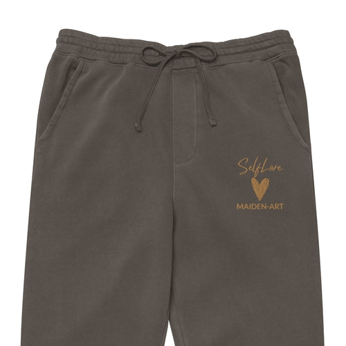 Brown sweatpants with 'SelfLove Maiden-Art' embroidery on a white background