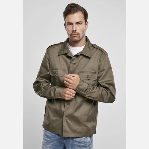 Man wearing a brown jacket on a light gray background