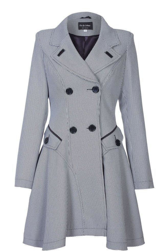 Gray houndstooth patterned coat with black buttons on a white background