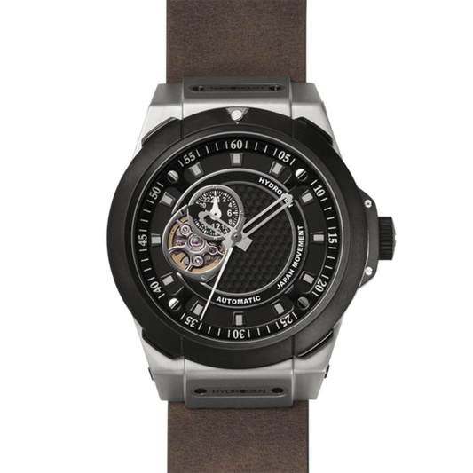 Watch with black face and brown leather strap on a white background