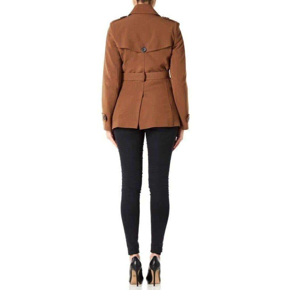 Brown jacket worn by a person on a white background