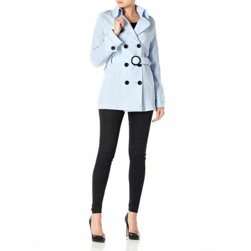 Light blue coat with black buttons worn by a person on a white background
