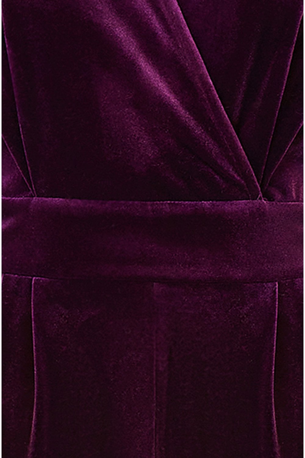 Close-up of a purple velvet garment with a belt